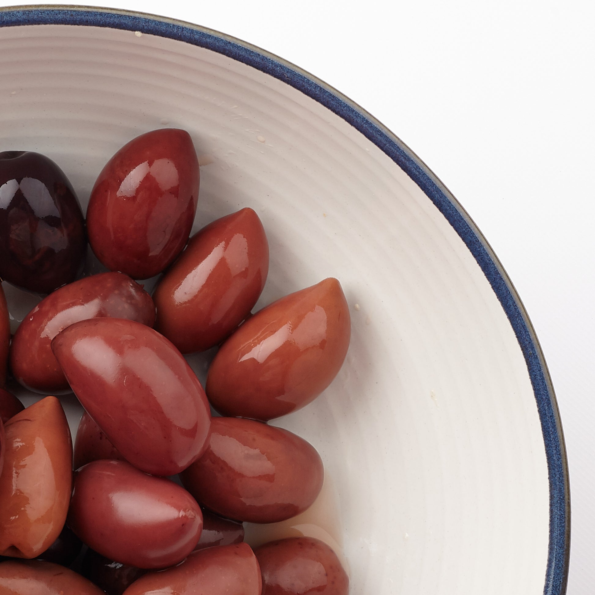 Close up of kalamata olives in a bowl. Yummy.