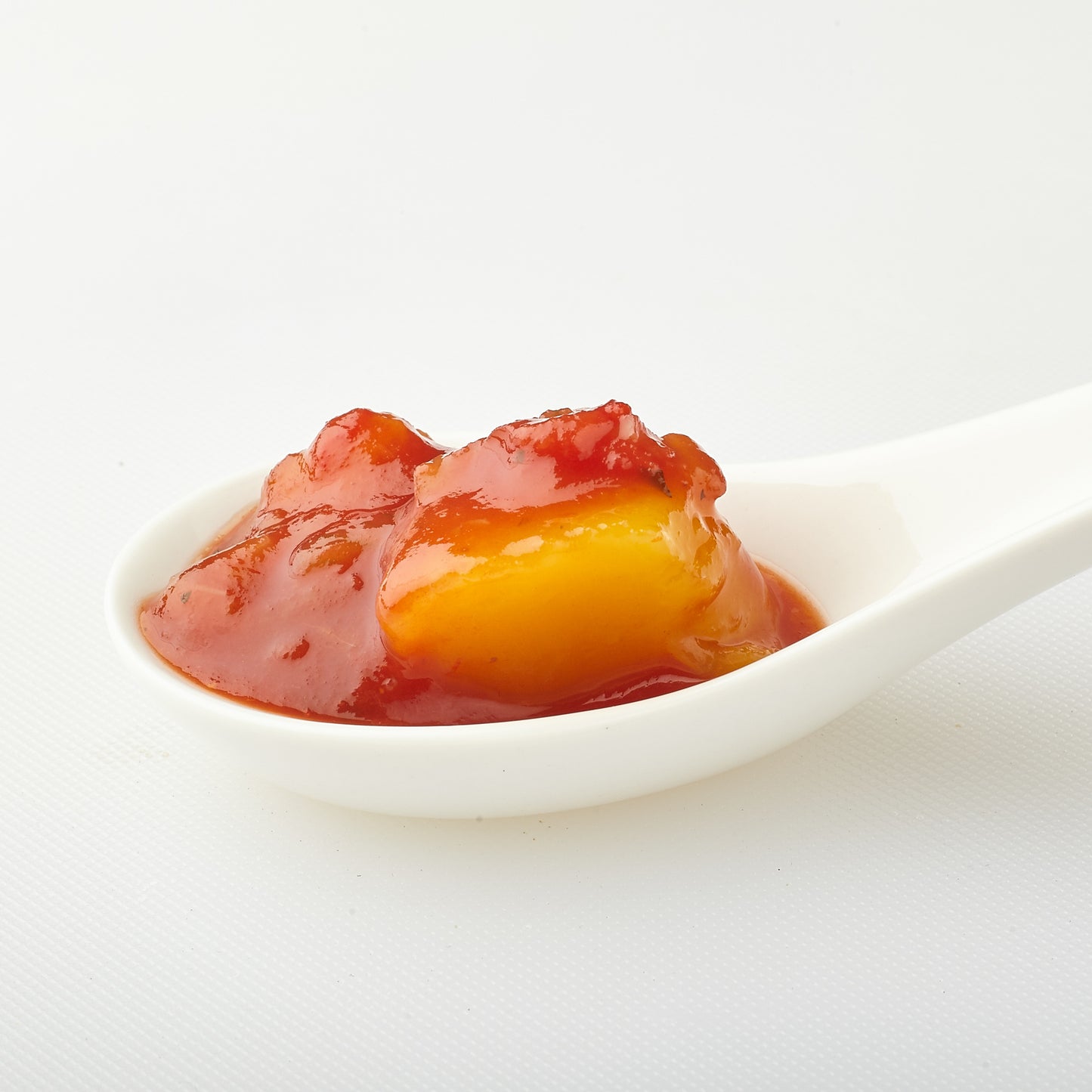 A spoonful of Yoko's Mango Tango Salsa.